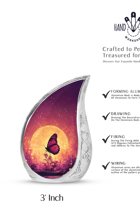 Blush Pink Butterfly Cremation Urn angled view of lid and engraved motif - rounded teardrop butterfly design with delicate detail - mini keepsake memorial for portion of cremation ashes