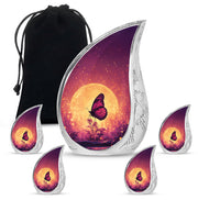 Rose Pink Butterfly Cremation Urn side profile showing urn shape - rounded teardrop butterfly design with delicate detail - memorial set with one large and four small urns