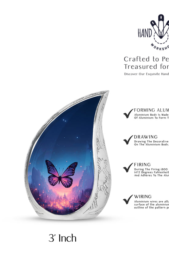 Icy Blue Butterfly Cremation Urn angled view of lid and engraved motif - flowing teardrop butterfly silhouette on curved aluminum - mini keepsake memorial for portion of cremation ashes