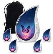 Indigo Butterfly Cremation Urn side profile showing urn shape - flowing teardrop butterfly silhouette on curved aluminum - memorial set with one large and four small urns