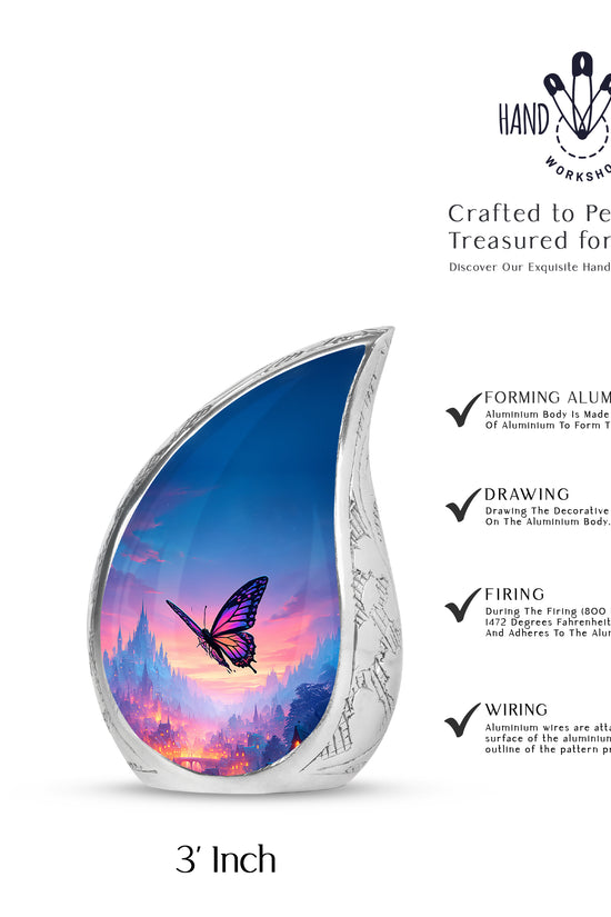 Azure Butterfly Cremation Urn angled view of lid and engraved motif - flowing teardrop butterfly silhouette on curved aluminum - mini keepsake memorial for portion of cremation ashes