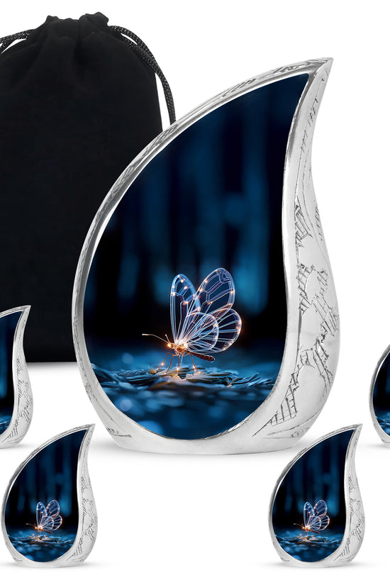 Deep Black Butterfly Cremation Urn side profile showing urn shape - rounded teardrop butterfly design with delicate detail - memorial set with one large and four small urns
