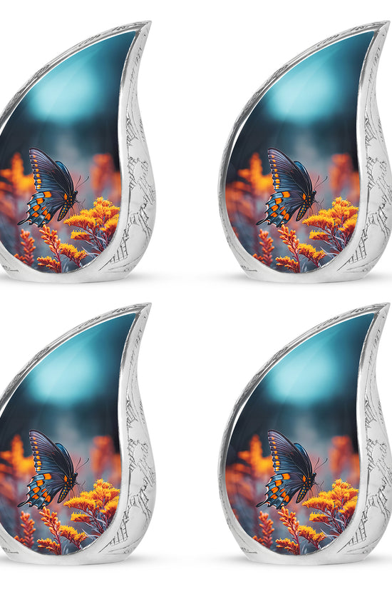 Calming Blue Butterfly Cremation Urn close-up of engraving and surface detail - smooth teardrop contour featuring butterfly art - 10 inch aluminum urn for cremated remains