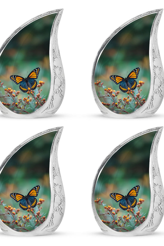 Jade Green Butterfly Cremation Urn close-up of engraving and surface detail - rounded teardrop butterfly design with delicate detail - 10 inch aluminum urn for cremated remains