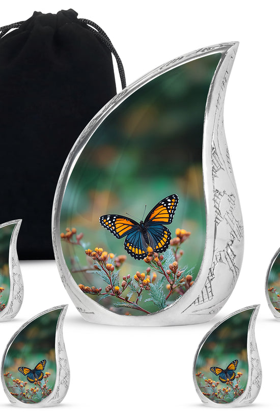 Pine Green Butterfly Cremation Urn side profile showing urn shape - graceful tear-shaped urn with butterfly motif - memorial set with one large and four small urns