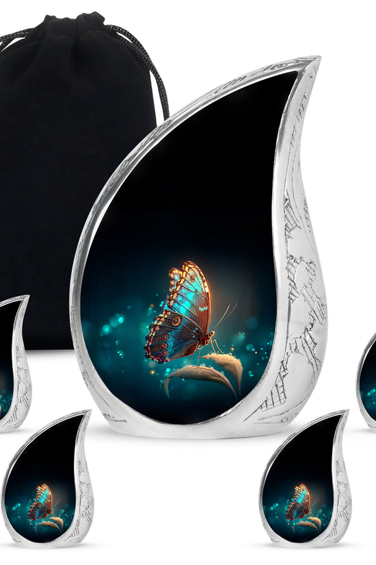 Jet Black Butterfly Cremation Urn side profile showing urn shape - flowing teardrop butterfly silhouette on curved aluminum - memorial set with one large and four small urns