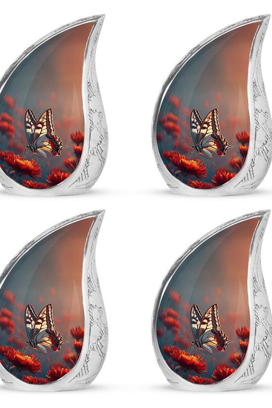 Vivid Blue Butterfly Cremation Urn close-up of engraving and surface detail - smooth teardrop contour featuring butterfly art - 10 inch aluminum urn for cremated remains