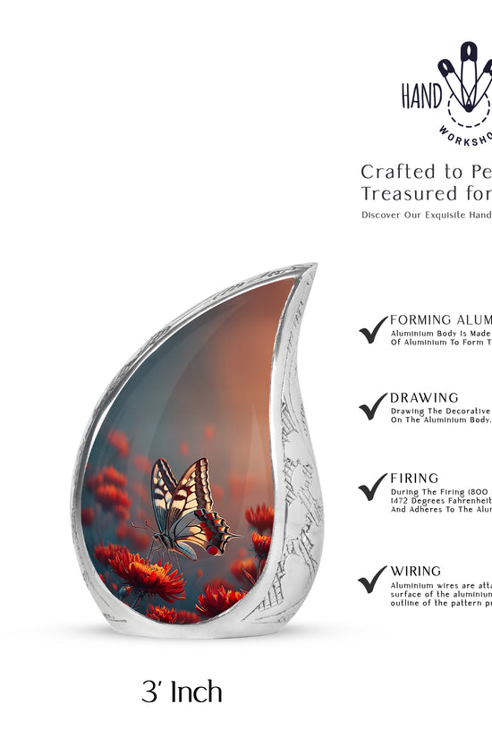 Celestial Blue Butterfly Cremation Urn angled view of lid and engraved motif - rounded teardrop butterfly design with delicate detail - mini keepsake memorial for portion of cremation ashes