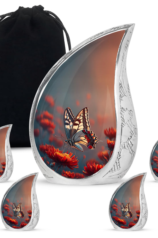 Azure Butterfly Cremation Urn side profile showing urn shape - flowing teardrop butterfly silhouette on curved aluminum - memorial set with one large and four small urns