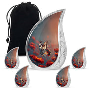 Azure Butterfly Cremation Urn side profile showing urn shape - flowing teardrop butterfly silhouette on curved aluminum - memorial set with one large and four small urns