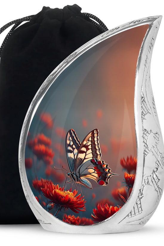 Sapphire Blue Butterfly Cremation Urn front view showing detailed design - graceful tear-shaped urn with butterfly motif - full-size 10 inch 200 cubic inch adult cremation urn