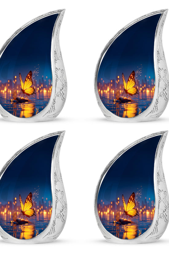 Celestial Blue Butterfly Cremation Urn close-up of engraving and surface detail - rounded teardrop butterfly design with delicate detail - 10 inch aluminum urn for cremated remains