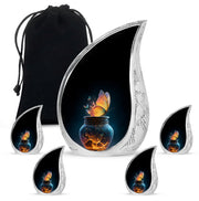 Glossy Black Butterfly Cremation Urn side profile showing urn shape - rounded teardrop butterfly design with delicate detail - memorial set with one large and four small urns