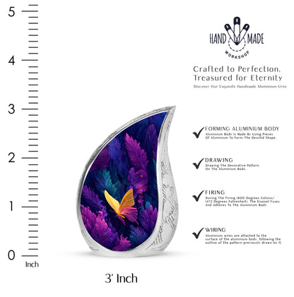 Vivid Blue Butterfly Cremation Urn angled view of lid and engraved motif - smooth teardrop contour featuring butterfly art - mini keepsake memorial for portion of cremation ashes