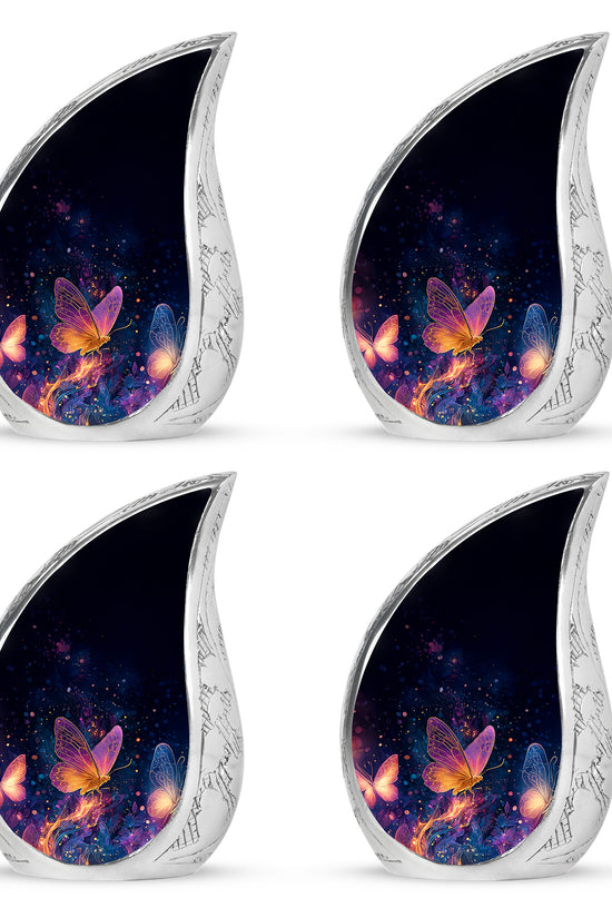 Deep Black Butterfly Cremation Urn close-up of engraving and surface detail - flowing teardrop butterfly silhouette on curved aluminum - 10 inch aluminum urn for cremated remains