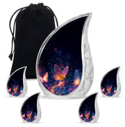 Onyx Black Butterfly Cremation Urn side profile showing urn shape - graceful tear-shaped urn with butterfly motif - memorial set with one large and four small urns
