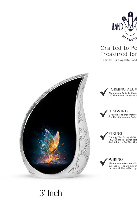 Glossy Black Butterfly Cremation Urn angled view of lid and engraved motif - flowing teardrop butterfly silhouette on curved aluminum - mini keepsake memorial for portion of cremation ashes