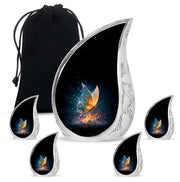 Deep Black Butterfly Cremation Urn side profile showing urn shape - flowing teardrop butterfly silhouette on curved aluminum - memorial set with one large and four small urns