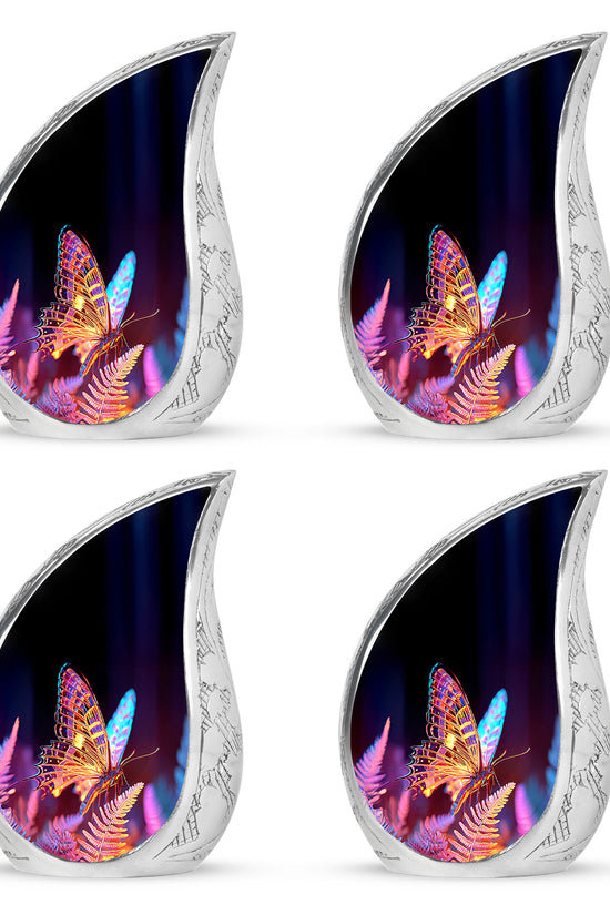 Dark Black Butterfly Cremation Urn close-up of engraving and surface detail - smooth teardrop contour featuring butterfly art - 10 inch aluminum urn for cremated remains