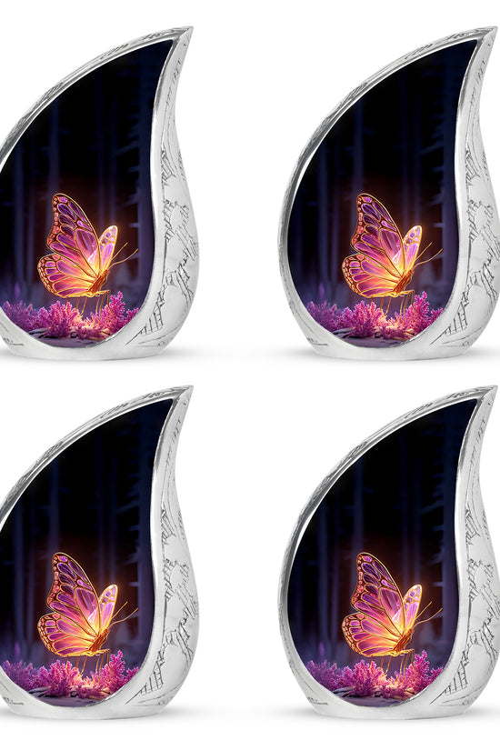Ebony Butterfly Cremation Urn close-up of engraving and surface detail - flowing teardrop butterfly silhouette on curved aluminum - 10 inch aluminum urn for cremated remains