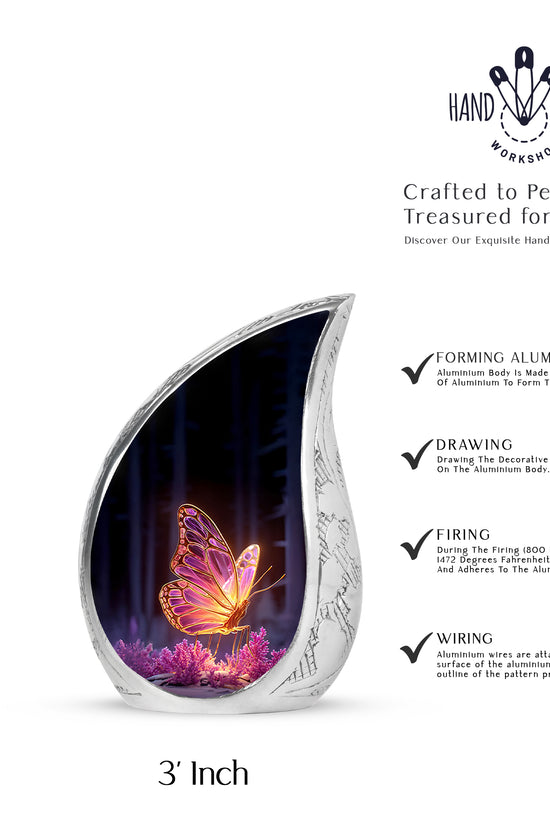 Rich Black Butterfly Cremation Urn angled view of lid and engraved motif - flowing teardrop butterfly silhouette on curved aluminum - mini keepsake memorial for portion of cremation ashes