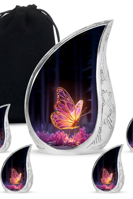 Glossy Black Butterfly Cremation Urn side profile showing urn shape - rounded teardrop butterfly design with delicate detail - memorial set with one large and four small urns