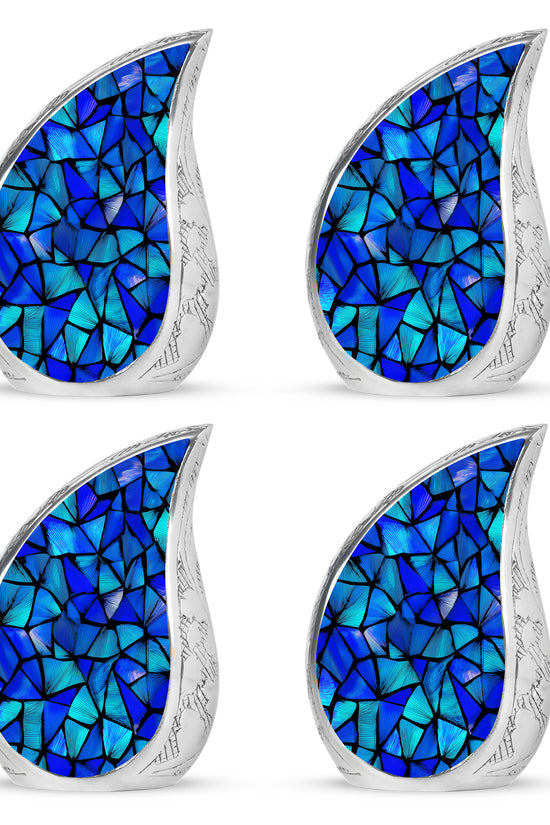 Soft Blue Blue Cremation Urn close-up of engraving and surface detail - smooth teardrop contour featuring blue art - 10 inch aluminum urn for cremated remains