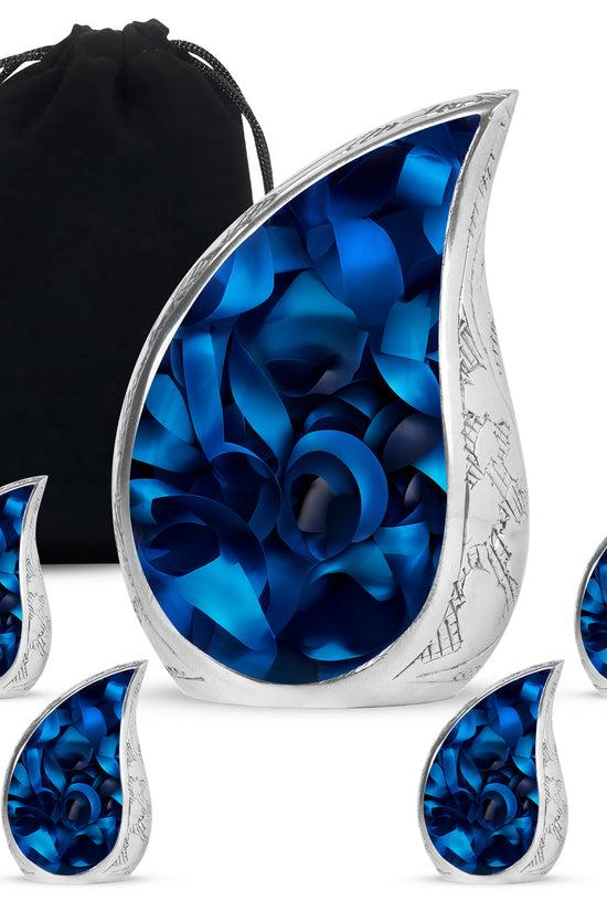 Rich Black Blue Cremation Urn side profile showing urn shape - flowing teardrop blue silhouette on curved aluminum - memorial set with one large and four small urns