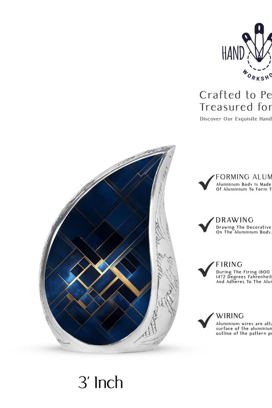 Celestial Blue Blue Cremation Urn angled view of lid and engraved motif - rounded teardrop blue design with delicate detail - mini keepsake memorial for portion of cremation ashes