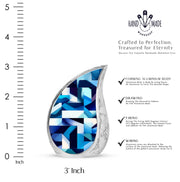 Twilight Blue Blue Cremation Urn angled view of lid and engraved motif - graceful tear-shaped urn with blue motif - mini keepsake memorial for portion of cremation ashes