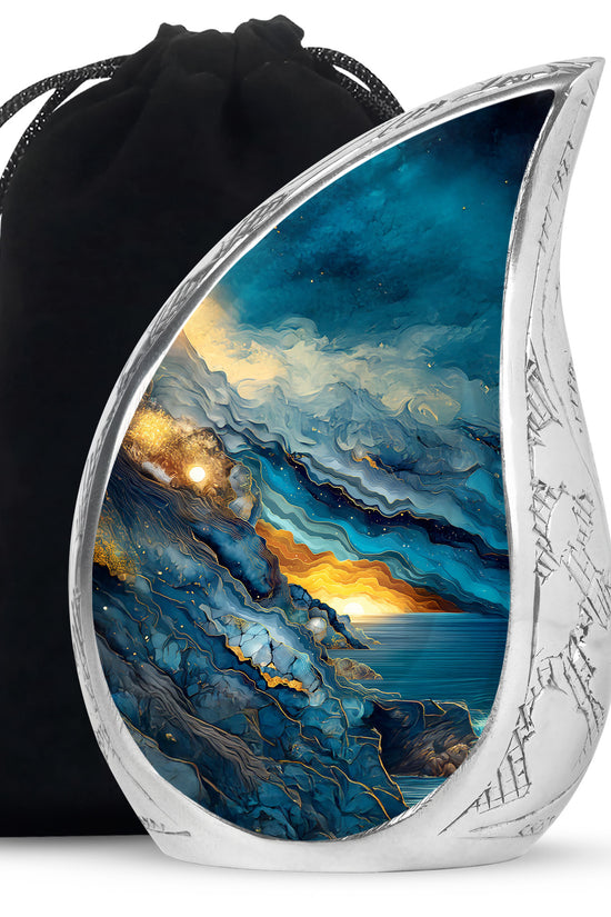 Powder Blue Blue Cremation Urn front view showing detailed design - flowing teardrop blue silhouette on curved aluminum - full-size 10 inch 200 cubic inch adult cremation urn