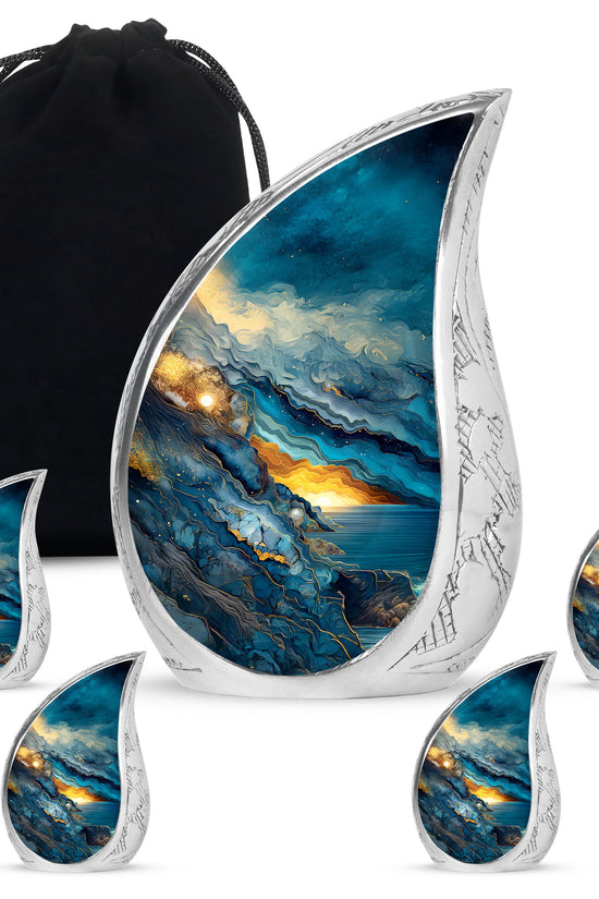 Icy Blue Blue Cremation Urn side profile showing urn shape - flowing teardrop blue silhouette on curved aluminum - memorial set with one large and four small urns