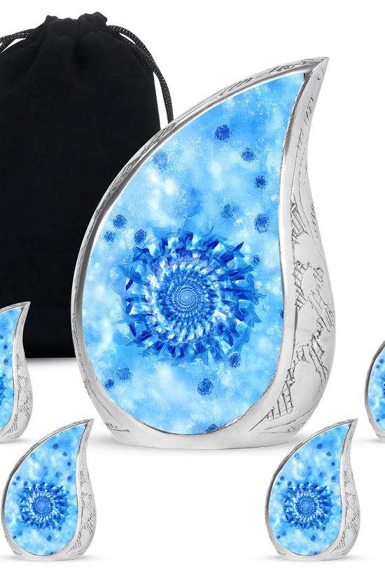 Dusty Blue Blue Cremation Urn side profile showing urn shape - rounded teardrop blue design with delicate detail - memorial set with one large and four small urns