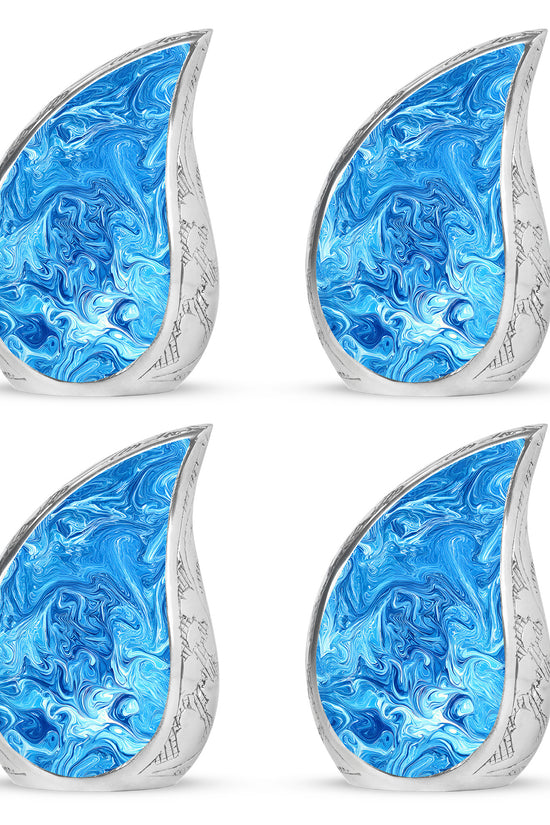 Indigo Blue Cremation Urn close-up of engraving and surface detail - flowing teardrop blue silhouette on curved aluminum - 10 inch aluminum urn for cremated remains