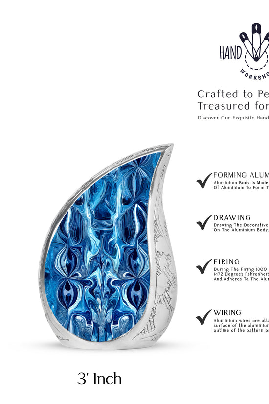 Navy Blue Blue Cremation Urn angled view of lid and engraved motif - rounded teardrop blue design with delicate detail - mini keepsake memorial for portion of cremation ashes
