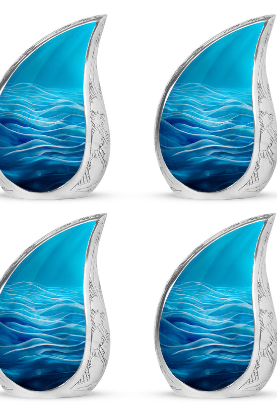 Icy Blue Blue Cremation Urn close-up of engraving and surface detail - flowing teardrop blue silhouette on curved aluminum - 10 inch aluminum urn for cremated remains
