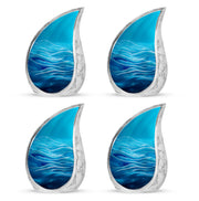 Icy Blue Blue Cremation Urn close-up of engraving and surface detail - flowing teardrop blue silhouette on curved aluminum - 10 inch aluminum urn for cremated remains