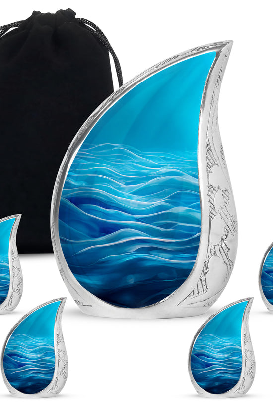 Azure Blue Cremation Urn side profile showing urn shape - flowing teardrop blue silhouette on curved aluminum - memorial set with one large and four small urns