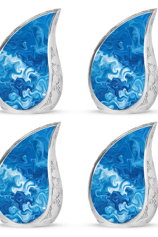 Soft Blue Blue Cremation Urn close-up of engraving and surface detail - smooth teardrop contour featuring blue art - 10 inch aluminum urn for cremated remains