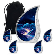 Steel Blue Blue Cremation Urn side profile showing urn shape - smooth teardrop contour featuring blue art - memorial set with one large and four small urns