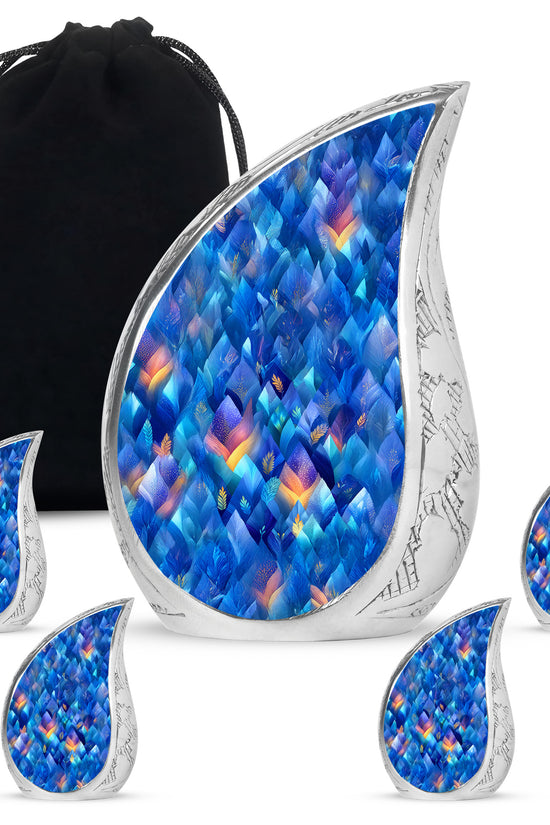 Slate Blue Blue Cremation Urn side profile showing urn shape - flowing teardrop blue silhouette on curved aluminum - memorial set with one large and four small urns