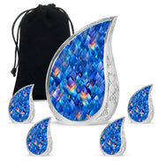 Slate Blue Blue Cremation Urn side profile showing urn shape - flowing teardrop blue silhouette on curved aluminum - memorial set with one large and four small urns