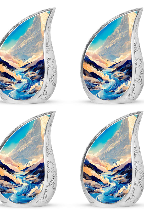 Soft Blue Blue Cremation Urn close-up of engraving and surface detail - graceful tear-shaped urn with blue motif - 10 inch aluminum urn for cremated remains