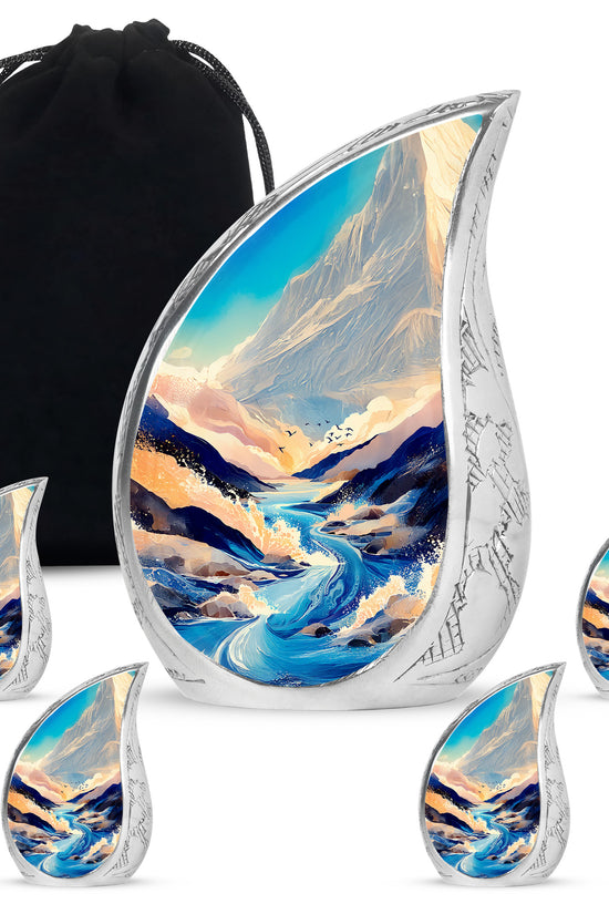 Indigo Blue Cremation Urn side profile showing urn shape - rounded teardrop blue design with delicate detail - memorial set with one large and four small urns