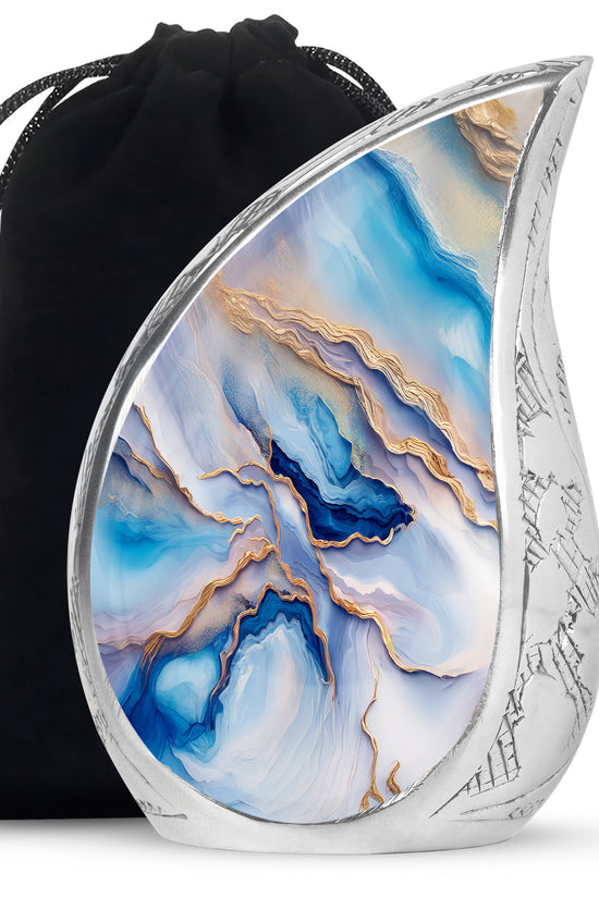 Icy Blue Blue Cremation Urn front view showing detailed design - flowing teardrop blue silhouette on curved aluminum - full-size 10 inch 200 cubic inch adult cremation urn