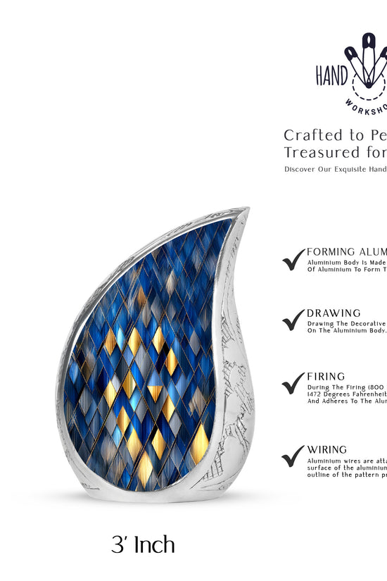 Twilight Blue Blue Cremation Urn angled view of lid and engraved motif - graceful tear-shaped urn with blue motif - mini keepsake memorial for portion of cremation ashes