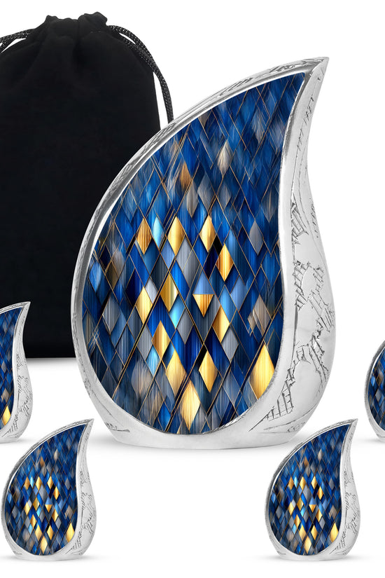 Icy Blue Blue Cremation Urn side profile showing urn shape - flowing teardrop blue silhouette on curved aluminum - memorial set with one large and four small urns