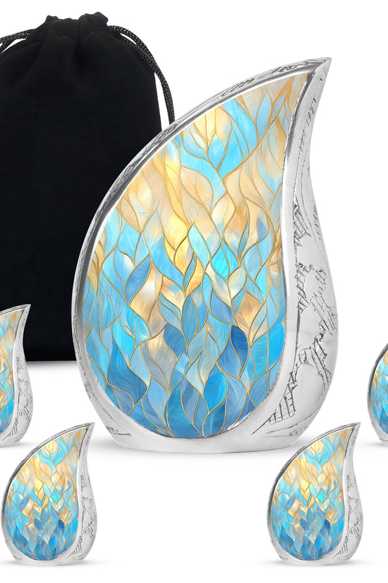Vivid Blue Blue Cremation Urn side profile showing urn shape - smooth teardrop contour featuring blue art - memorial set with one large and four small urns