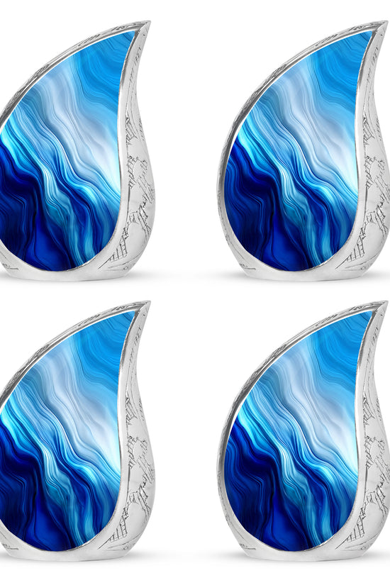 Misty Blue Blue Cremation Urn close-up of engraving and surface detail - flowing teardrop blue silhouette on curved aluminum - 10 inch aluminum urn for cremated remains