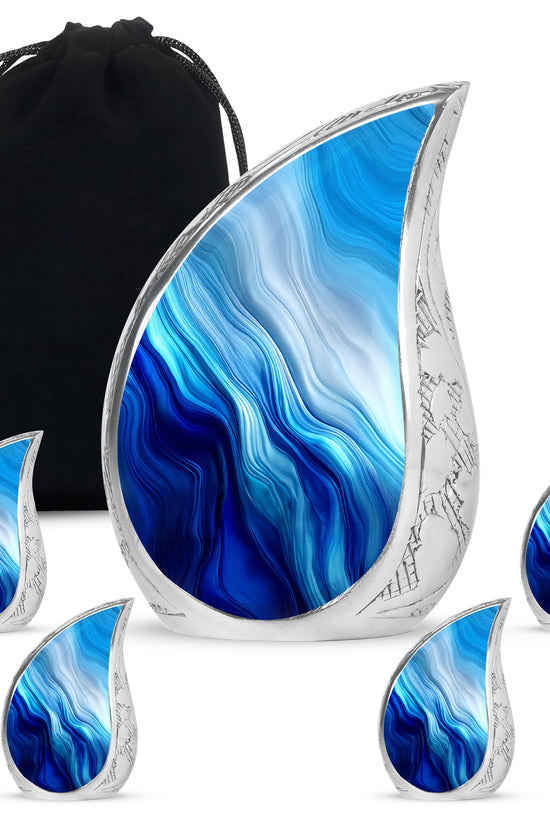 Soft Blue Blue Cremation Urn side profile showing urn shape - smooth teardrop contour featuring blue art - memorial set with one large and four small urns